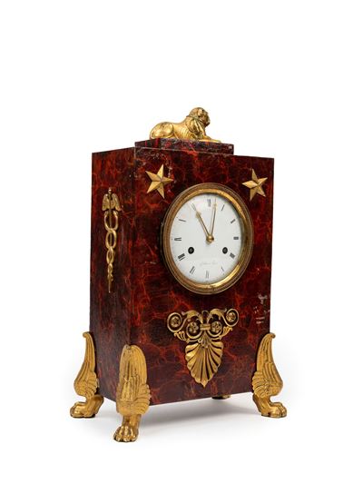 Orologio da camino in tôle peinte con montatura in bronzo dorato, Francia, inizio XIX secolo