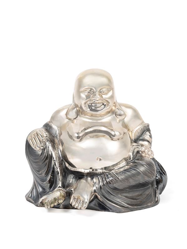 A SILVER BUDDHA