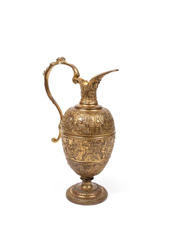 A GILT BRONZE EWER