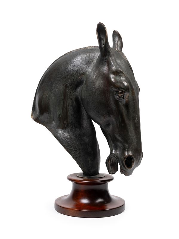 A BRONZE HORSE HEAD MODEL