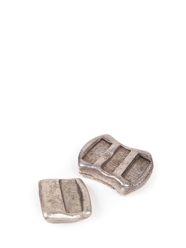 TWO SILVER LINGOTS