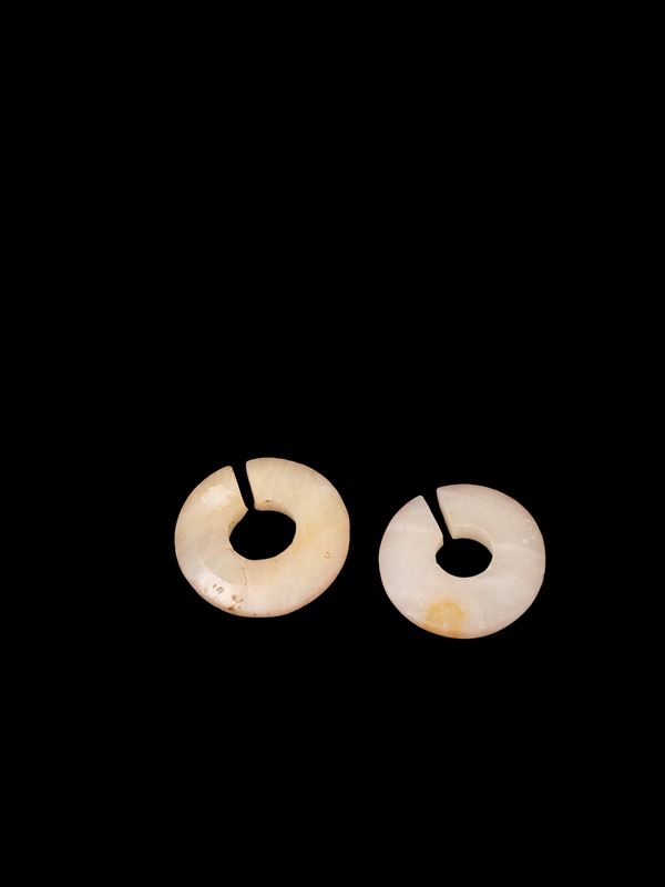 TWO WHITE OPAQUE JADE SLIT RING