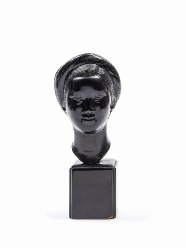 BRONZE HEAD OF A GIRL