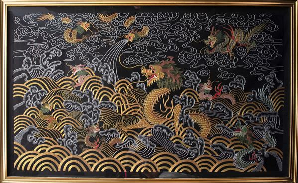 A LARGE FABRIC WITH DRAGONS