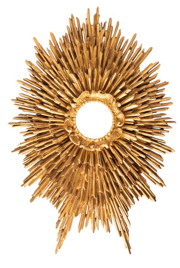 SUNBURST CARVED AND GILDED WOODEN FRAME