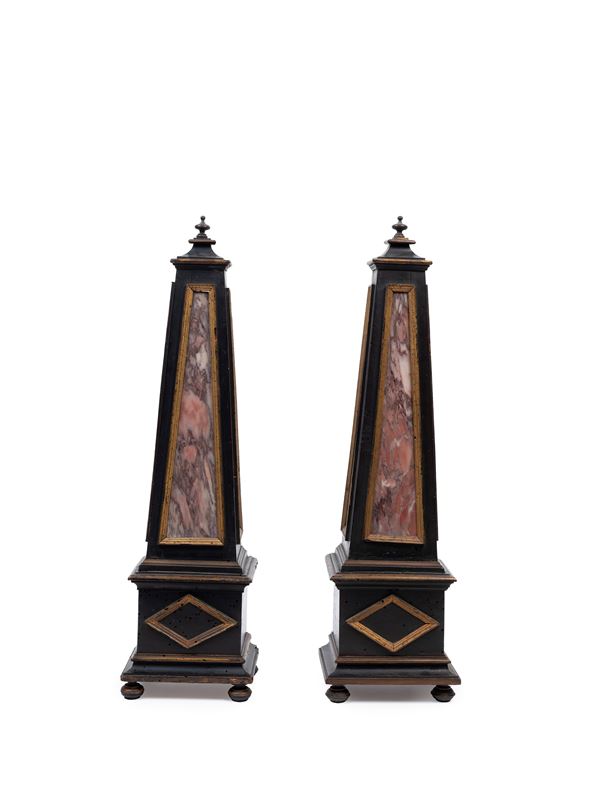 PAIR OF WOODEN AND MARBLE OBELISKS