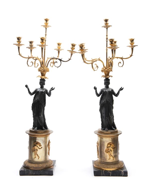 PAIR OF CANDELABRA IN BRONZE WITH DARK PATINA AND GILDING