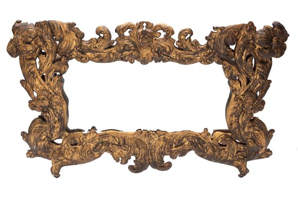 BAROQUE OVERDOOR MIRROR IN GILDED IRON