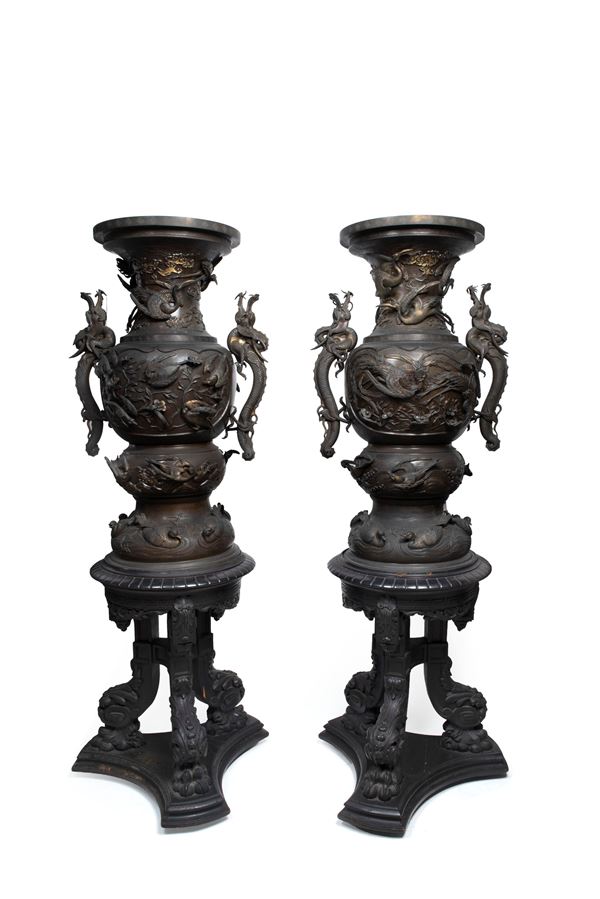 A LARGE PAIR OF BRONZE KOROS