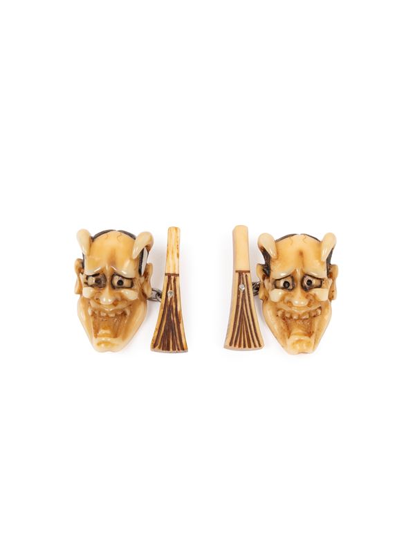 A PAIR OF MARINE IVORY CUFFLINKS DEPICTING HANNYA