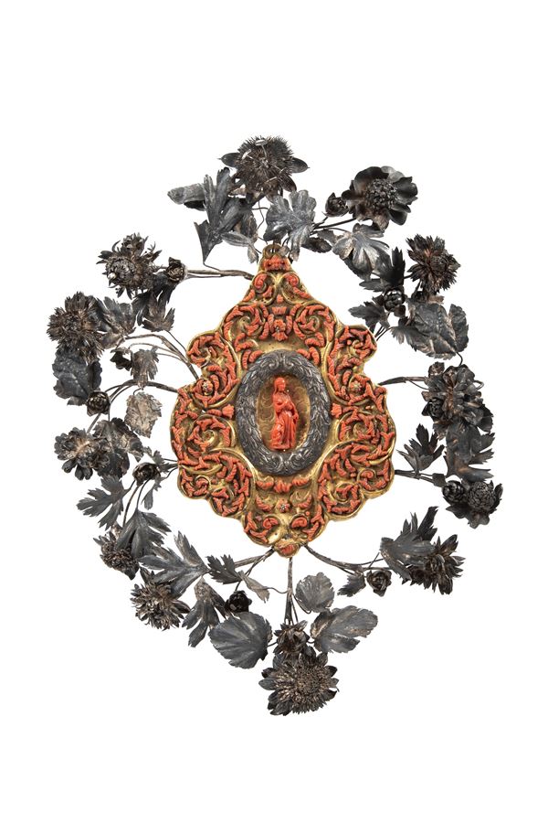☼A RELIQUARY IN CORAL, GILT COPPER, AND SILVER