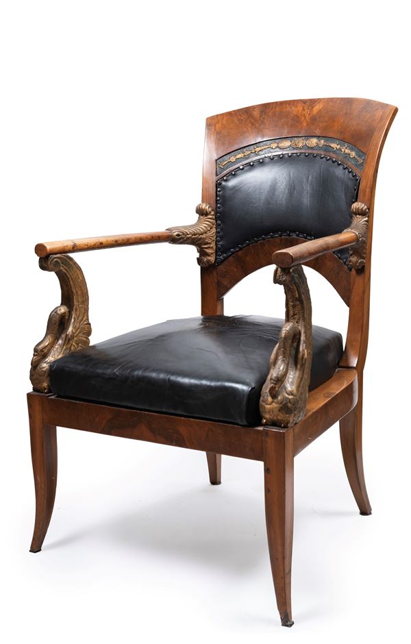 CARVED WOOD AND LEATHER ARMCHAIR