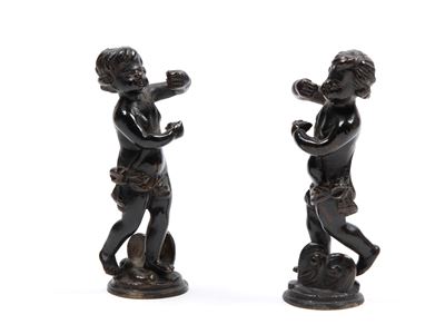 Putti in bronzo a patina scura, XVII secolo