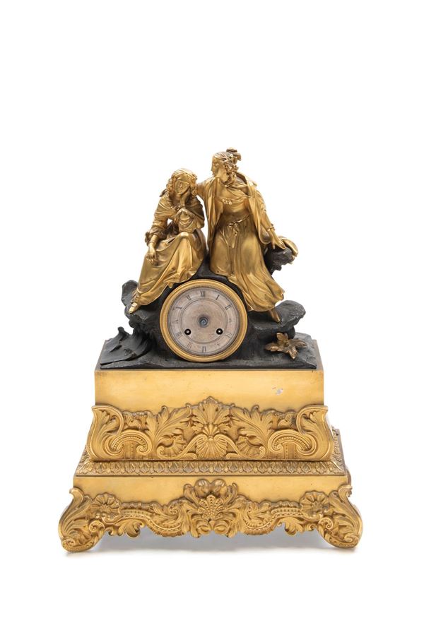 CHARLES X MANTEL CLOCK IN GILT AND DARK-PATINATED BRONZE