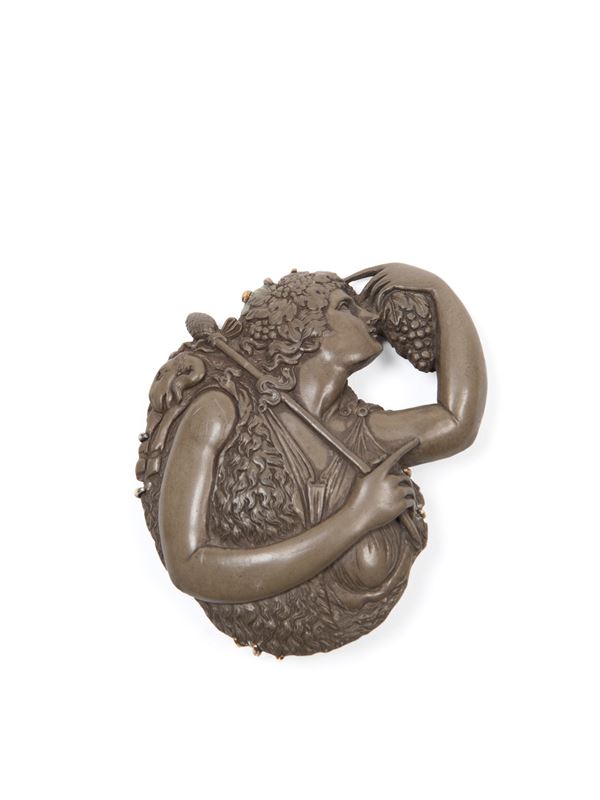 LAVA STONE CAMEO BROOCH DEPICTING A BACCHANTE WITH THYRSUS
