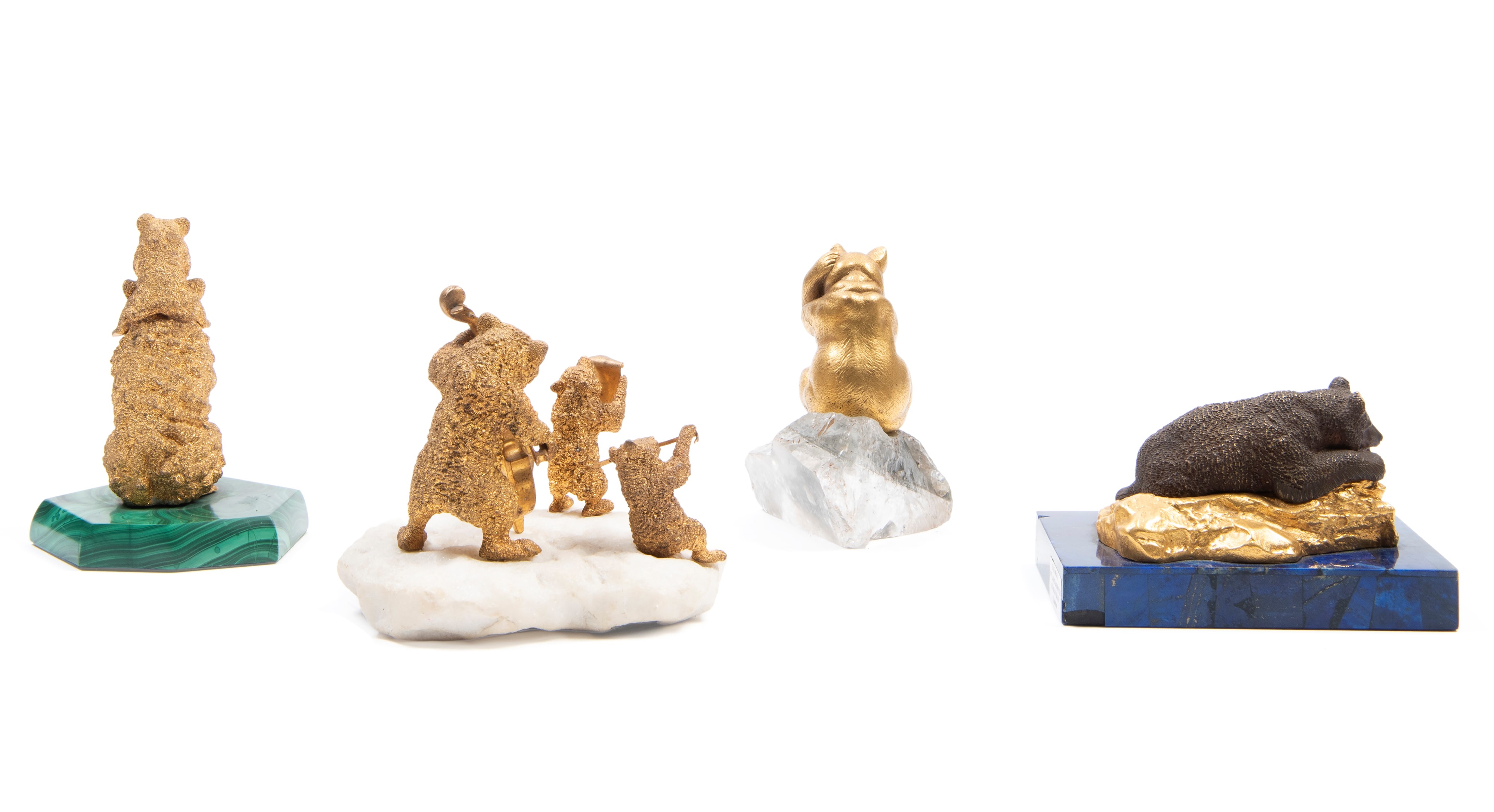 QUATTRO SCULTURE IN BRONZO DORATO E PIETRE DURE