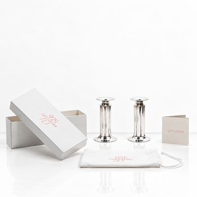 Coppia di candelieri in argento, altezza 15,6 cm