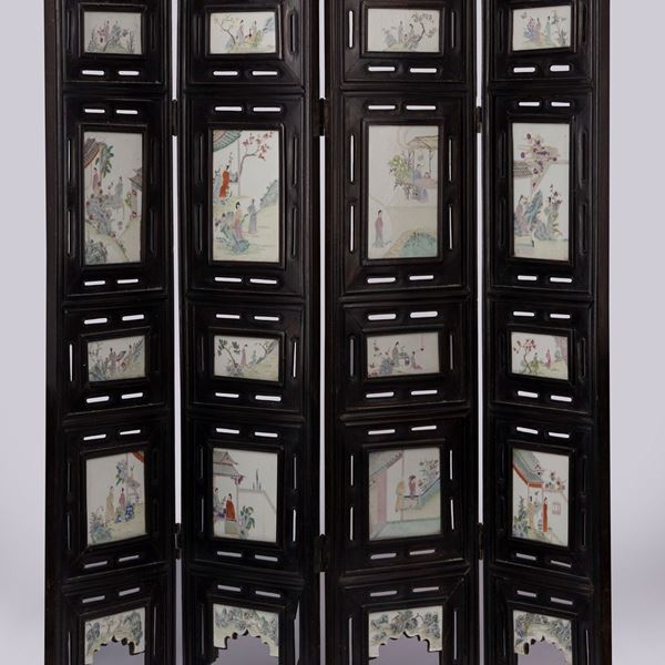 A WOOD AND PORCELAIN SCREEN