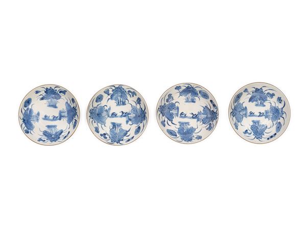 FOUR BLUE AND WHITE PORCELAIN PLATES