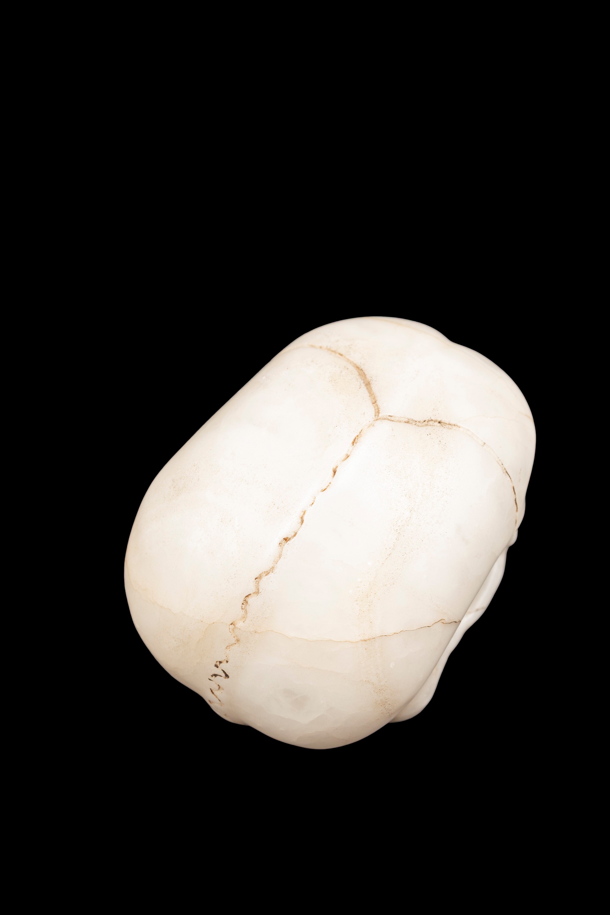 Memento mori in alabastro, teschio con volto sofferente in urlo, Germania XVII secolo