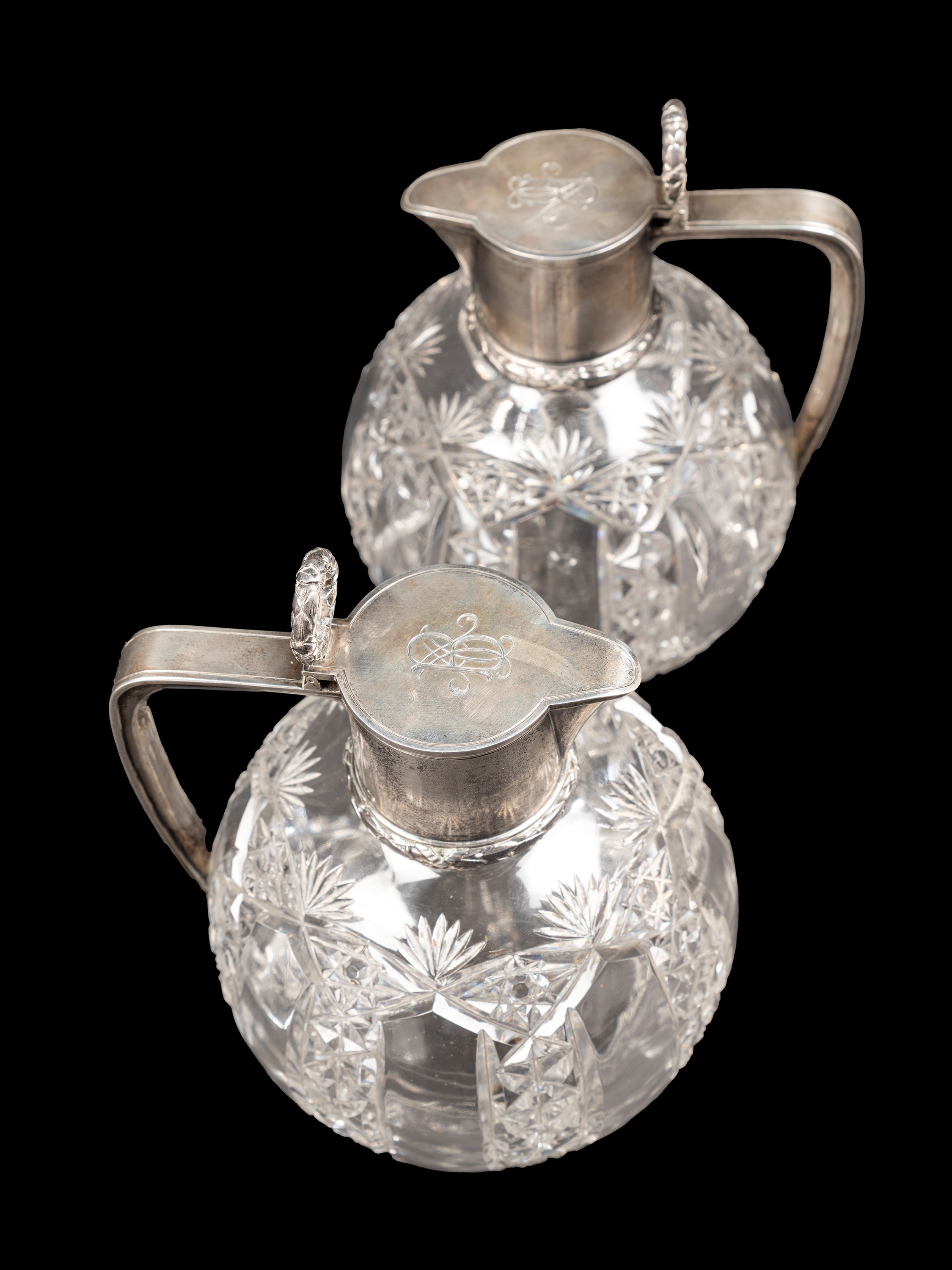 COPPIA DI BROCCHE IN CRISTALLO E ARGENTO