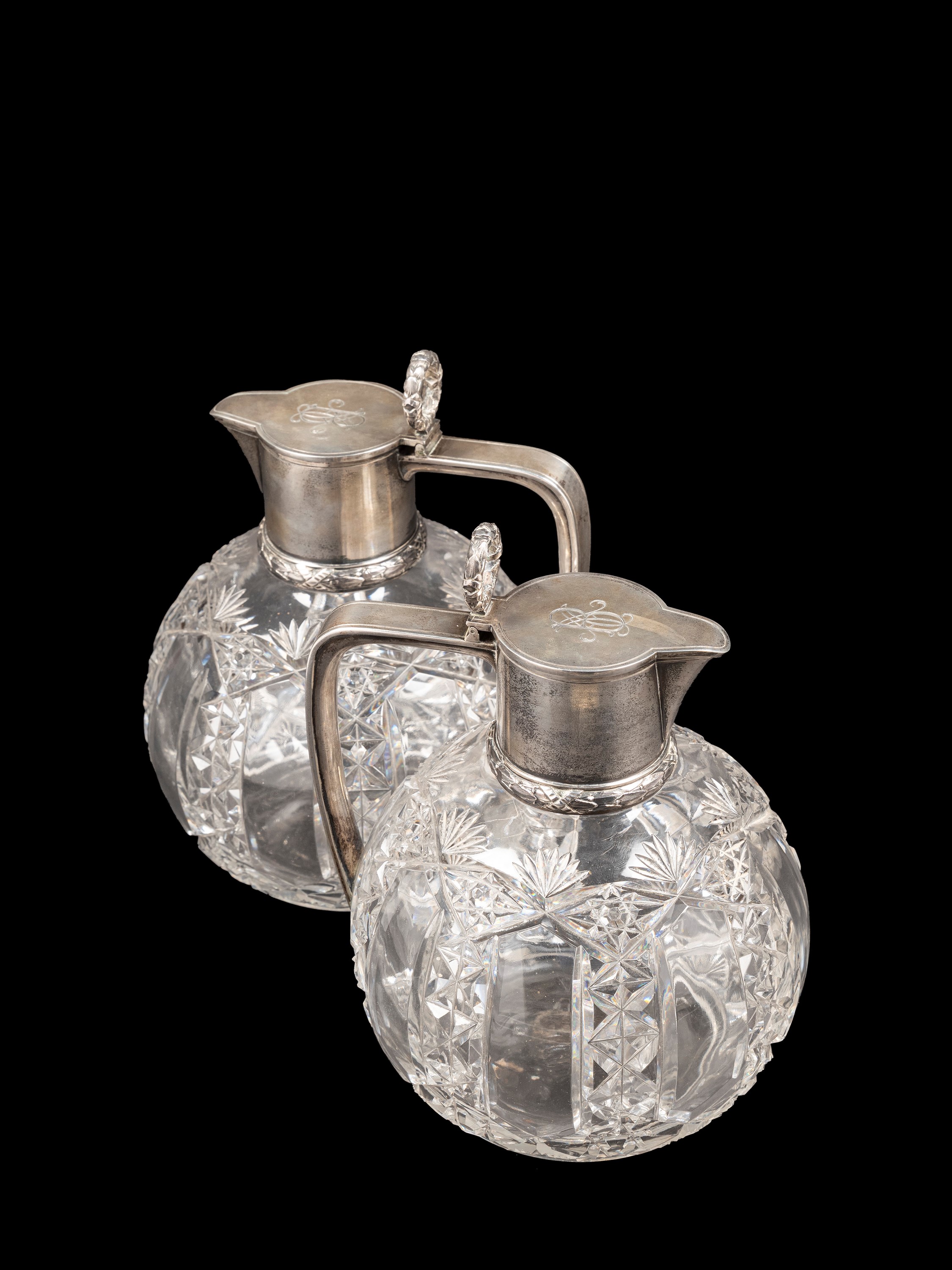 COPPIA DI BROCCHE IN CRISTALLO E ARGENTO