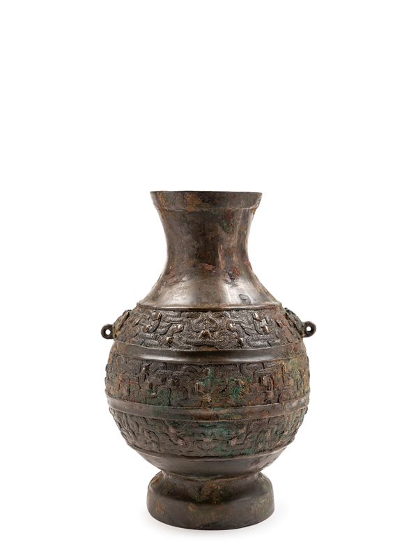 A BRONZE HU-SHAPED VASE