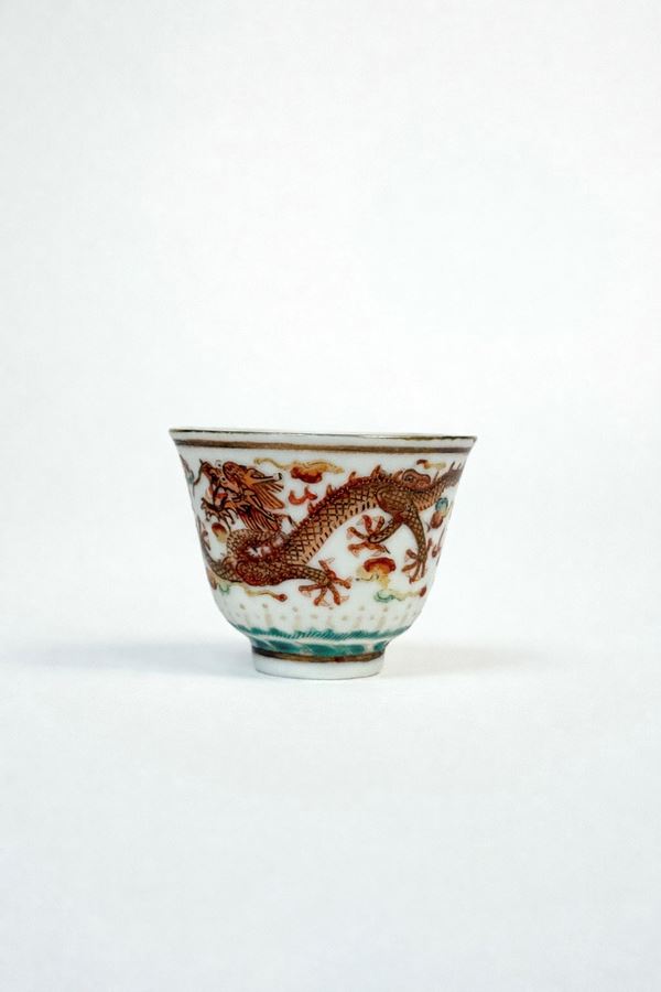 A SMALL PORCELAIN CUP
