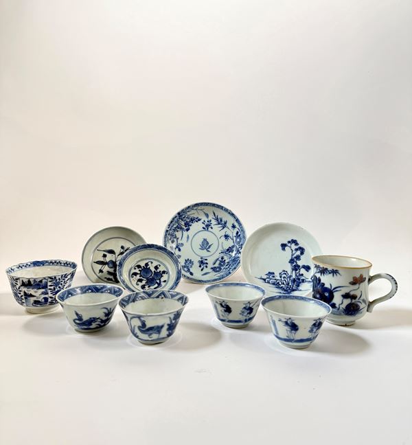 FIVE SMALL BOWLS, ONE CUP, AND FOUR SAUCERS IN BLUE-AND-WHITE PORCELAIN