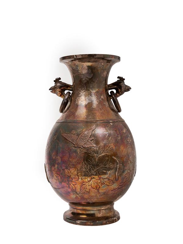 A TWO HANDLED SILVER VASE