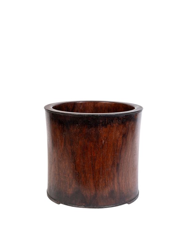 A LARGE WOODEN BITONG