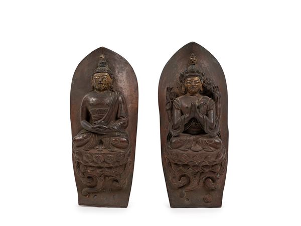 A PAIR OF REPOUSSÉ BRONZE DEITIES