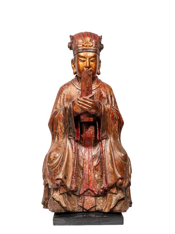 A LARGE WOODEN SCULPTURE