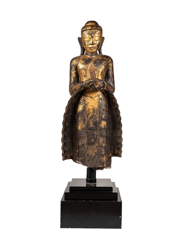 A GILT-STONE FIGURE OF MANDALAY BUDDHA