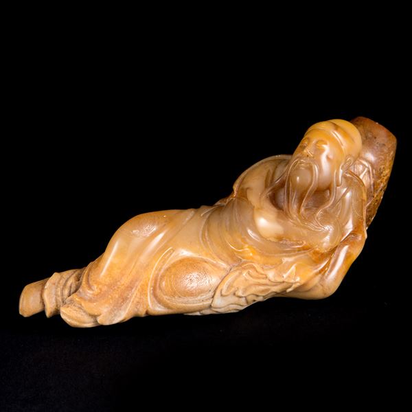 A SOAPSTONE FIGURE
