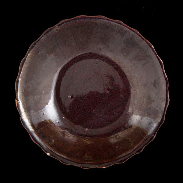 A MONOCHROME SAUCER