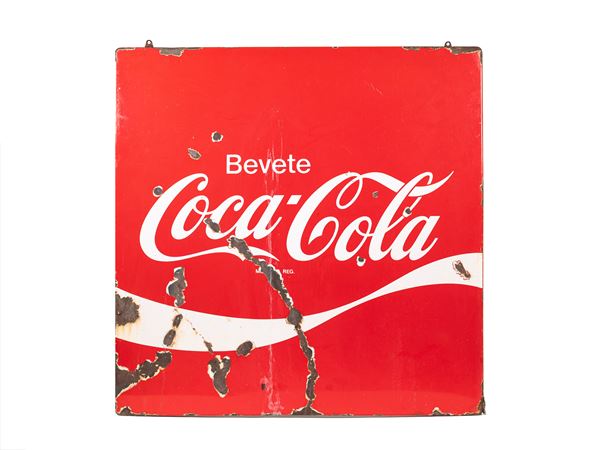 ADVERTISING SIGN WITH SLOGAN: DRINK COCA-COLA