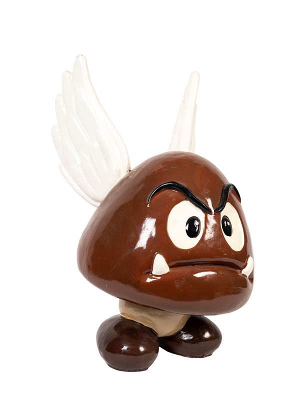 A VINTAGE SUPER MARIO BROS. GOOMBA FIGURE