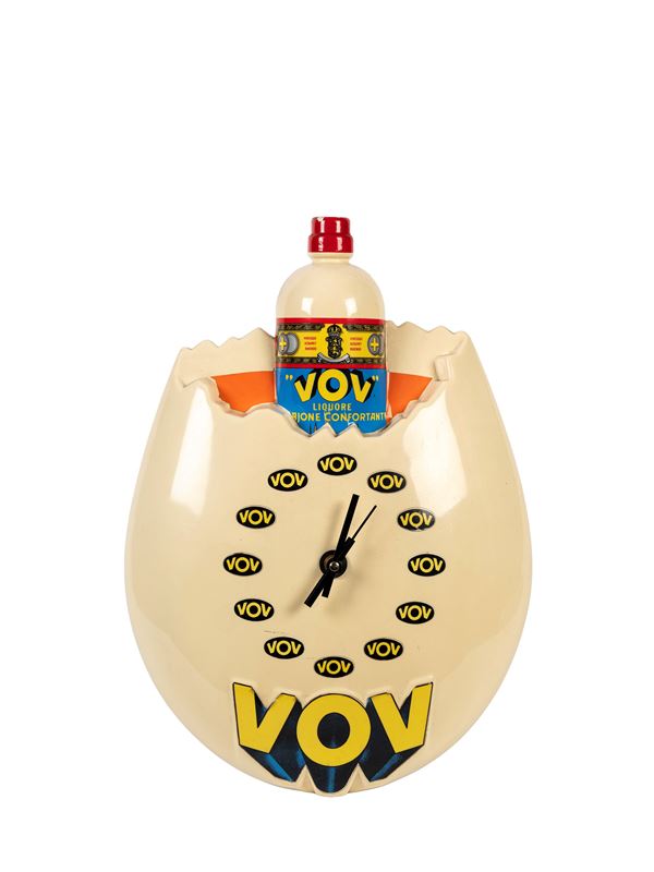 A VINTAGE 1970S LIQUORE VOV ADVERTISING CLOCK