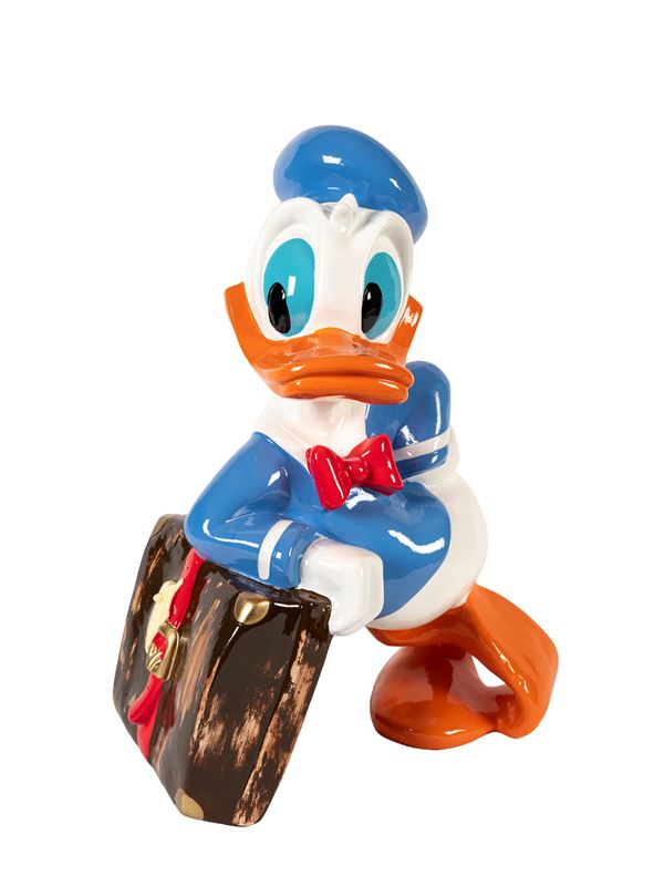 A DONALD DUCK (PAPERINO) FIGURE WITH SUITCASE, WALT DISNEY