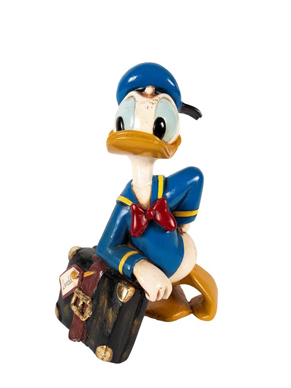 A DONALD DUCK (PAPERINO) FIGURE WITH SUITCASE, WALT DISNEY