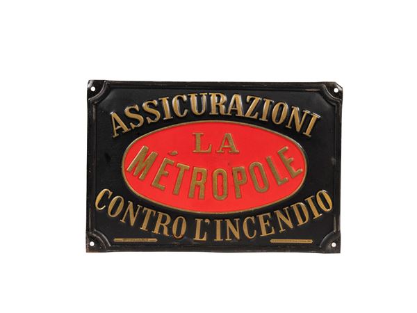 VINTAGE 1960s METAL SIGN WITH EMBOSSED LETTERING: LA METROPOLE FIRE INSURANCE