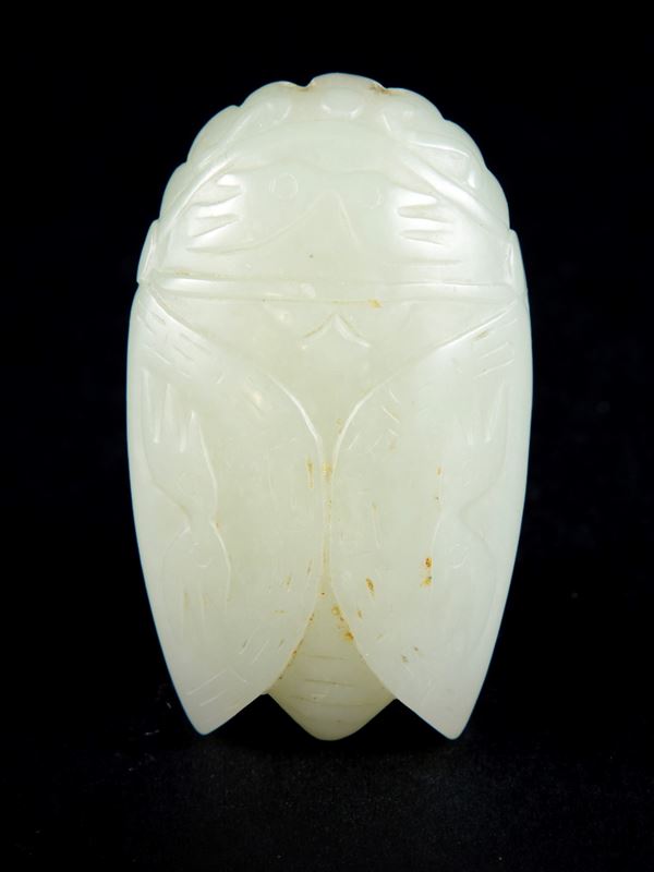 A SMALL JADE CARVING