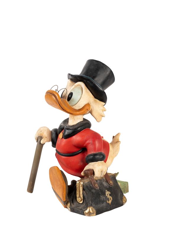 A UNCLE SCROOGE (SCROOGE MCDUCK) FIGURE BY WALT DISNEY IN RESIN