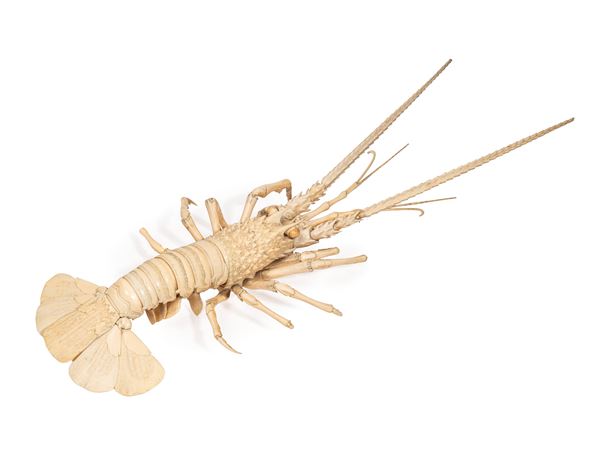 ☼AN IVORY OKIMONO DEPICTING A LOBSTER