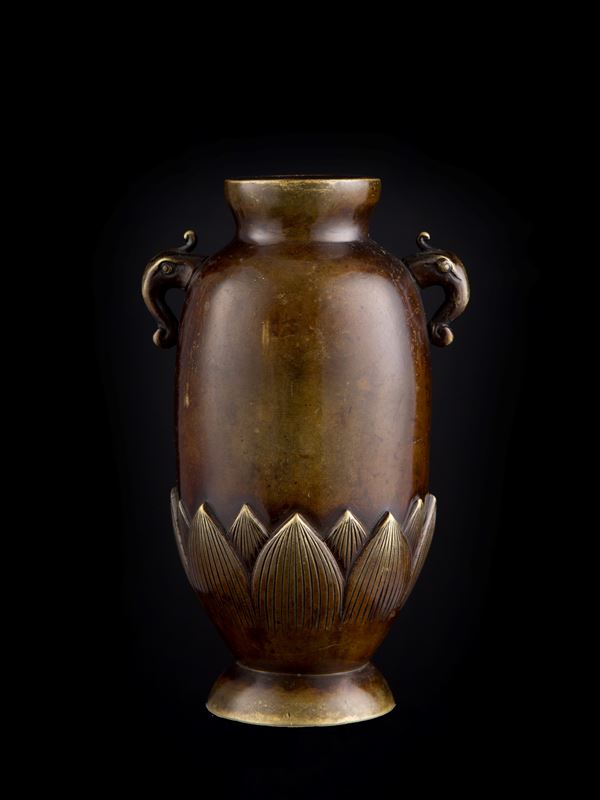 A SMALL BRONZE VASE