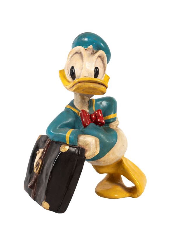 A DONALD DUCK (PAPERINO) FIGURE WITH SUITCASE, WALT DISNEY