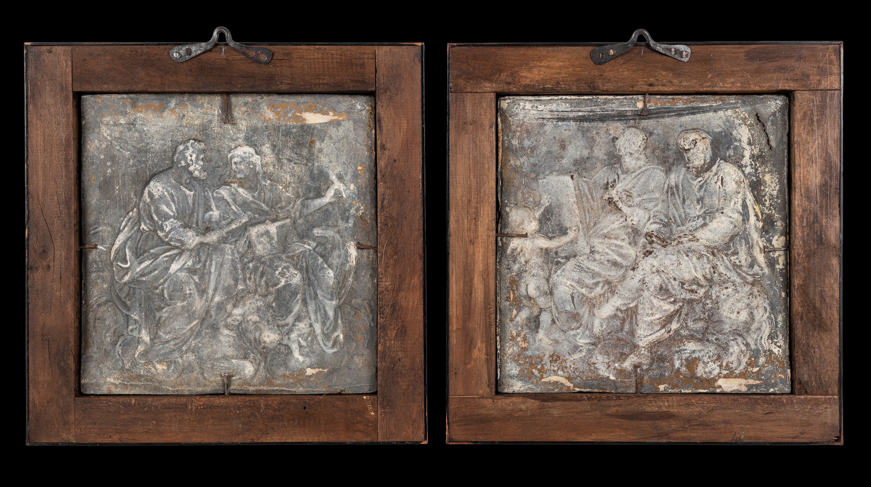 Area Toscana, XVII secolo, Coppia di rilievi in piombo raffiguranti i Quattro Evangelisti