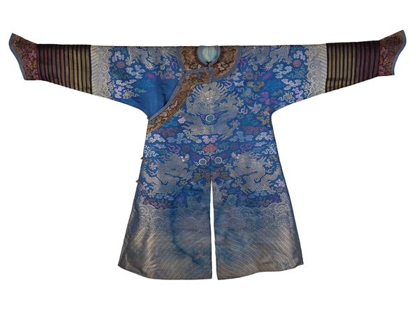 A BLUE-GROUND SILK BROCADE 'DRAGON' ROBE 