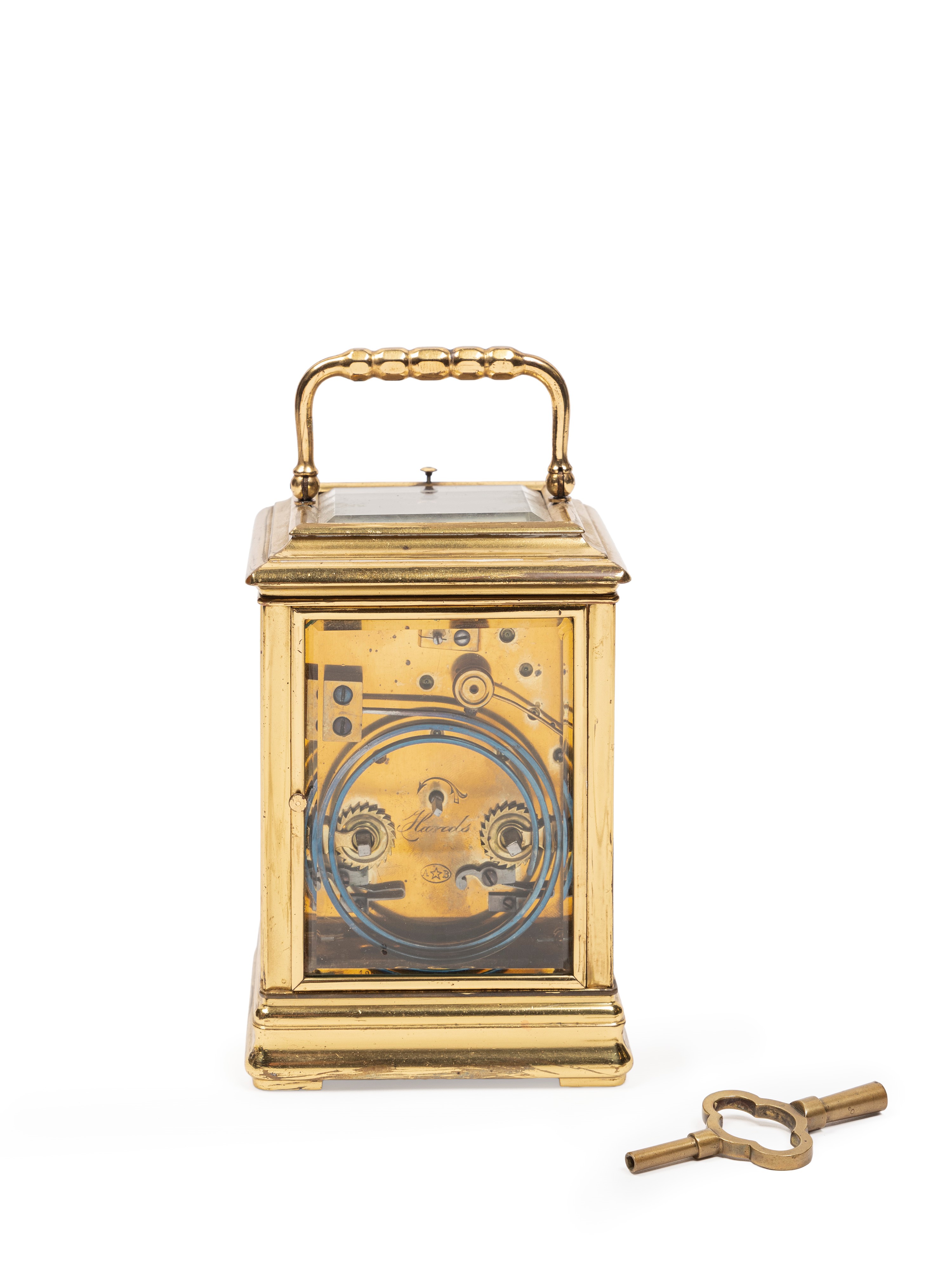 Orologio da carrozza, quadrante con numeri romani e placca in porcellana dipinta, in ottone dorat...
